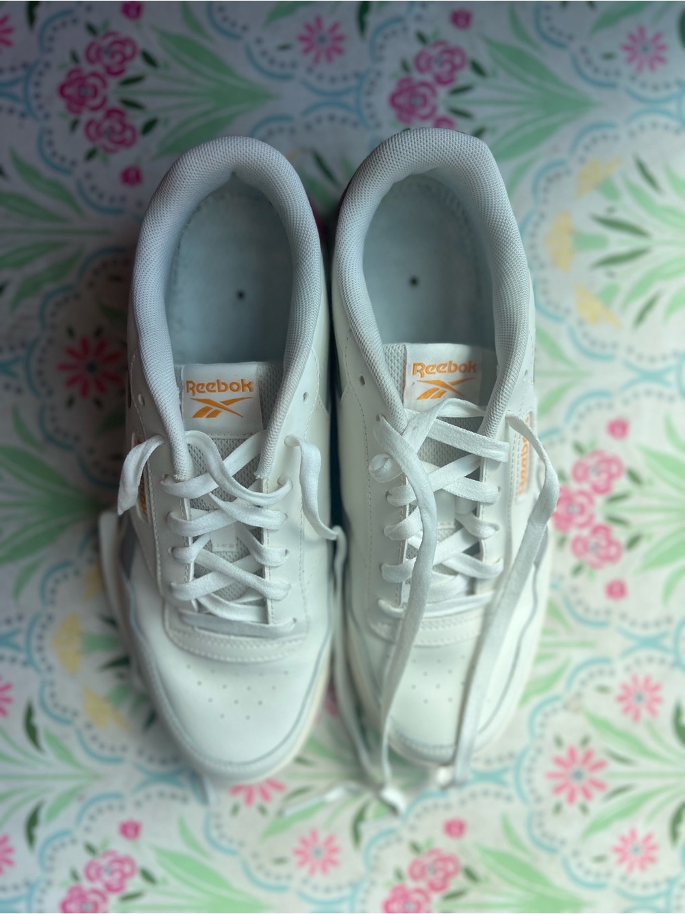 Reebok White Sneakers with Orange Logo Accents